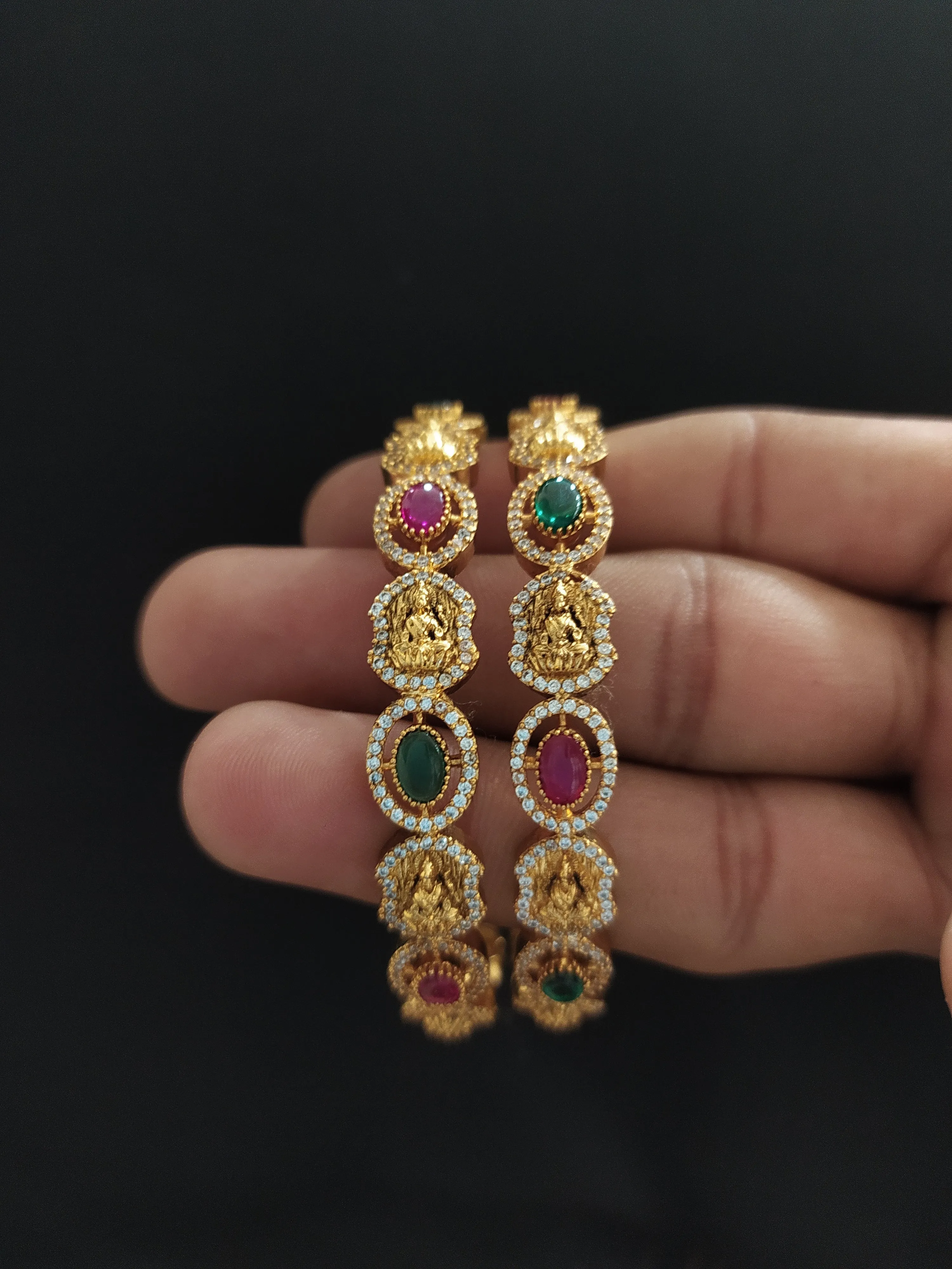 "Oval-Shaped Antique Lakshmi Bangles with Kemp, Green, and White Zircon Stones"